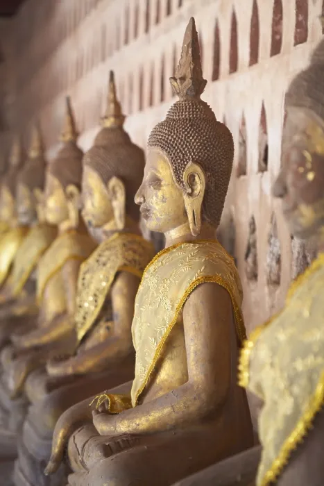 Framed Print : Ancient Buddha statues line the courtyard walkway at Wat Si Saket