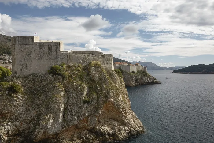 Framed Print : Ancient fortress on the cliff edge of Dubrovnik protects the port