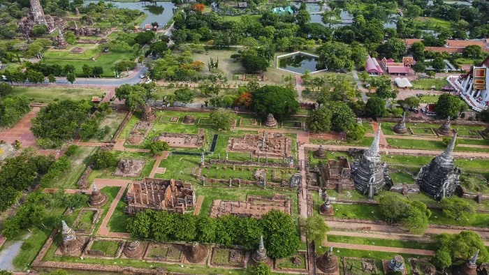 Framed Print : An ancient temple complex next to a city and a modern temple