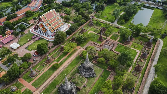 Framed Print : An ancient temple complex next to a city and a modern temple