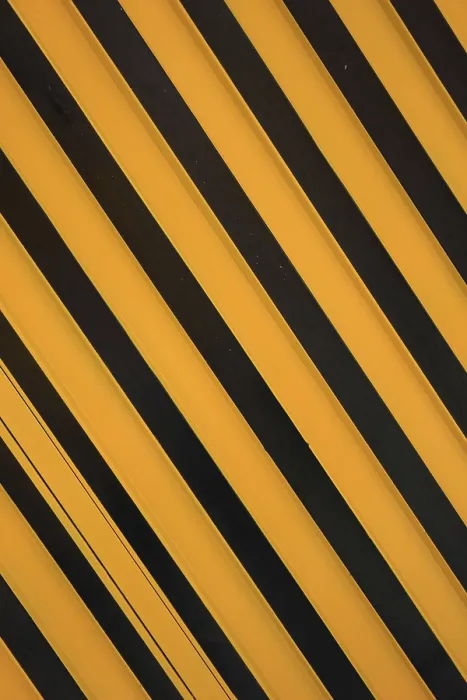 Framed Print : Angled yellow and black stripes on a steel door in Otavalo Framed Print : Angled yellow and black stripes on a steel door in Otavalo