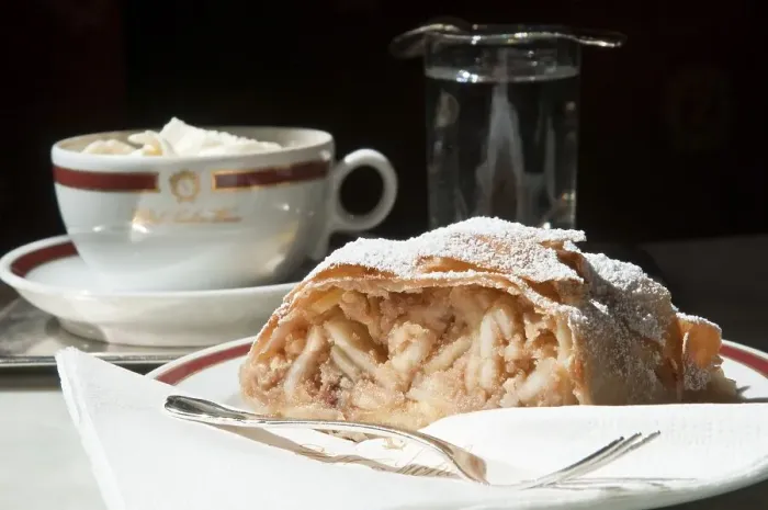 Framed Print : Apple strudel and coffee with frothy milk Framed Print : Apple strudel and coffee with frothy milk