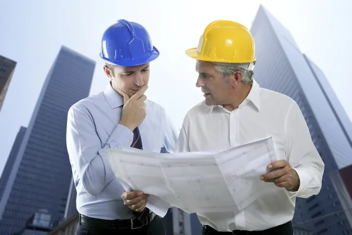 Framed Print : Architect engineer two expertise team plan talking hardhat skyscraper buildings