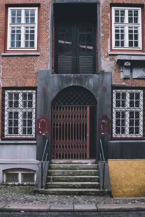 Framed Print : Architectural detail of an aged brick facade and secured
