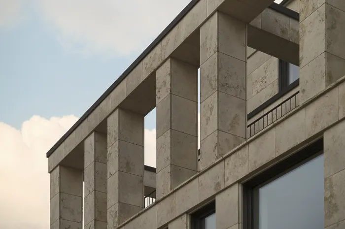 Framed Print : Architectural detail of a contemporary building showcasing travertine cladding and minimalist design