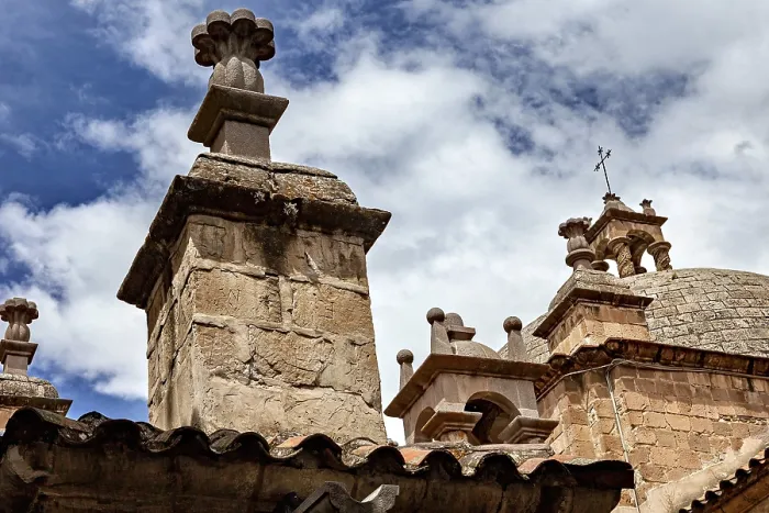 Framed Print : Architectural details of a church under a clear blue sky