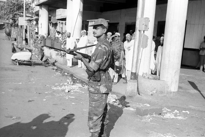 Framed Print : Army personnel & armed police deployed to prevent rioting after religious fundamentalists demolished the Babri Masjid in Ayodhya in Uttar Pradesh on 6 / 12 / 1992, The rioting continued till January 1993 in Bombay Mumbai, Maharashtra, India Framed Print : Army personnel & armed police deployed to prevent rioting after religious fundamentalists demolished the Babri Masjid in Ayodhya in Uttar Pradesh on 6 / 12 / 1992, The rioting continued till January 1993 in Bombay Mumbai, Maharashtra, India
