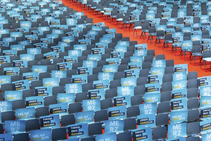 Framed Print : Assembly hall, deserted with many empty chairs and posters with the inscription UNSER KANNZLER