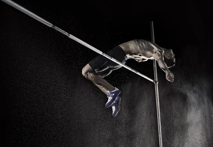 Framed Print : Athlete doing a high jump Framed Print : Athlete doing a high jump