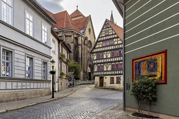 Framed Print : Atmospheric alley with half-timbered houses
