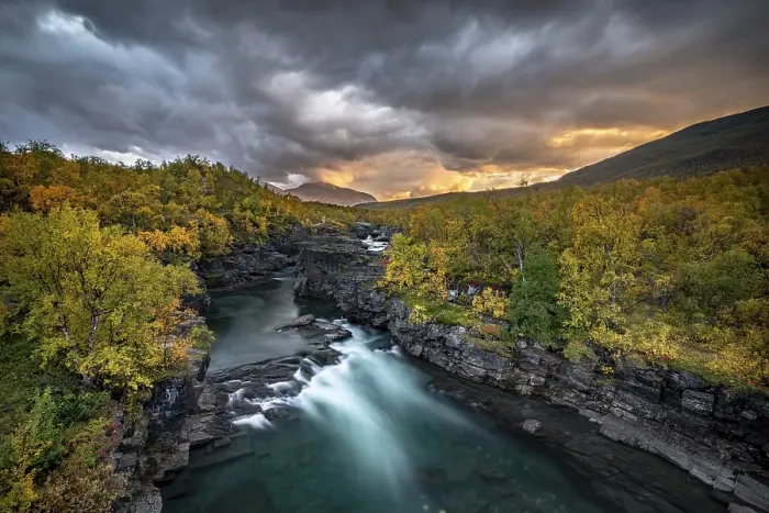 Framed Print : Autumn Abisko Canyon with dramatic lighting