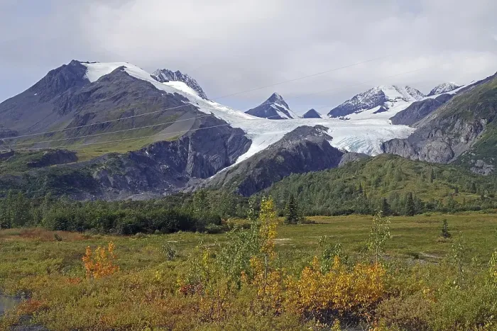 Framed Print : Autumn landscape and a glacier calving deep into the valley