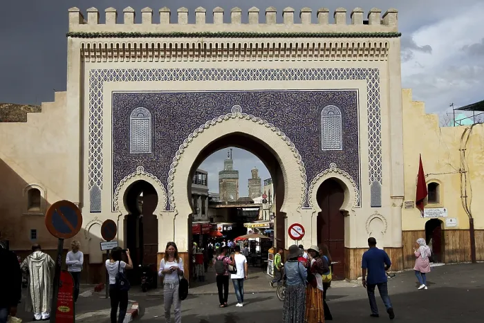 Framed Print : Bab Boujeloud in Fez with traditional mosaics and numerous passers-by Framed Print : Bab Boujeloud in Fez with traditional mosaics and numerous passers-by