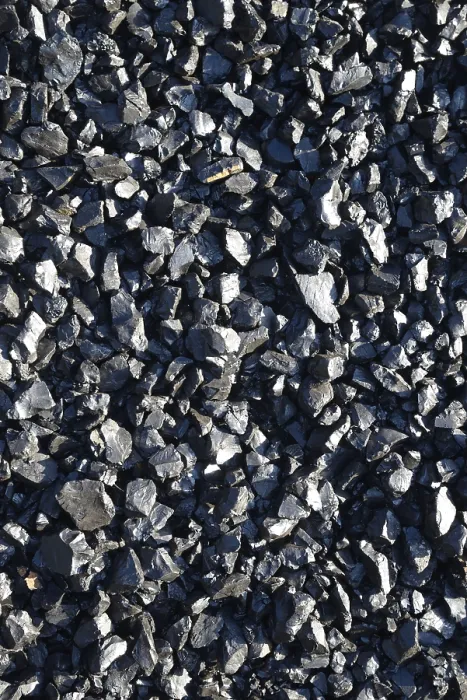 Framed Print : Background of pea grade coal from a West Coast brown coal mine