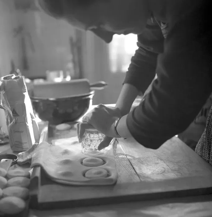Framed Print : A baker uses a drinking glass as a baking tin