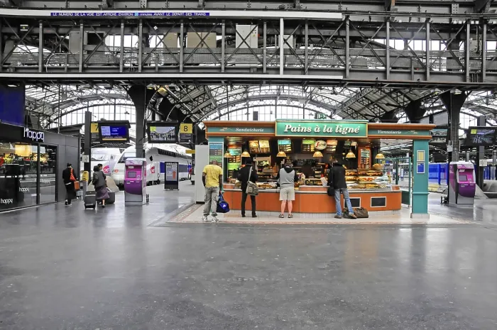 Framed Print : Bakery in the station area, with waiting customers and travellers
