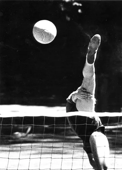 Framed Print : Balancing act at volleyball ca