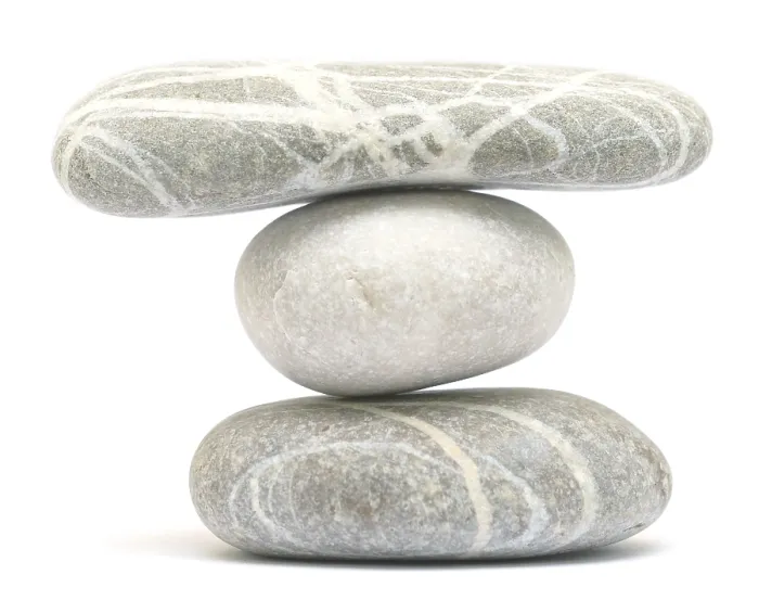 Framed Print : Balancing stone tower isolated on white background