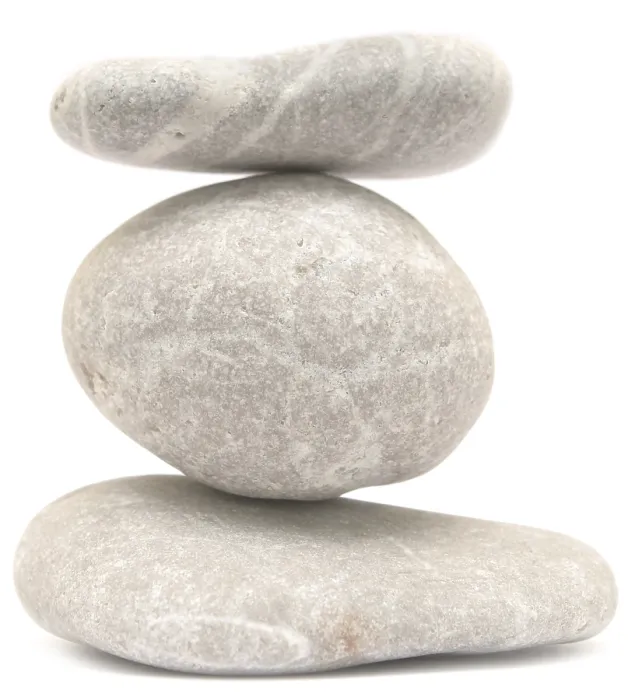 Framed Print : Balancing stone tower isolated on white background