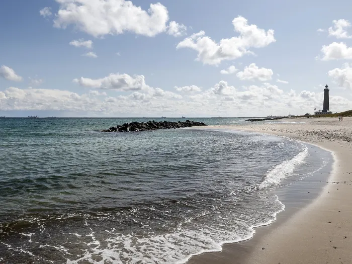 Framed Print : Baltic Sea beach with lighthouse in Skagen