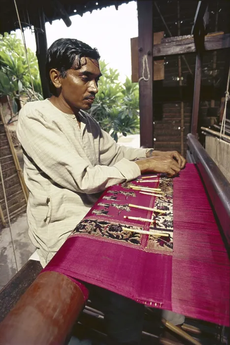 Framed Print : Banarasi saree weaver on his loom