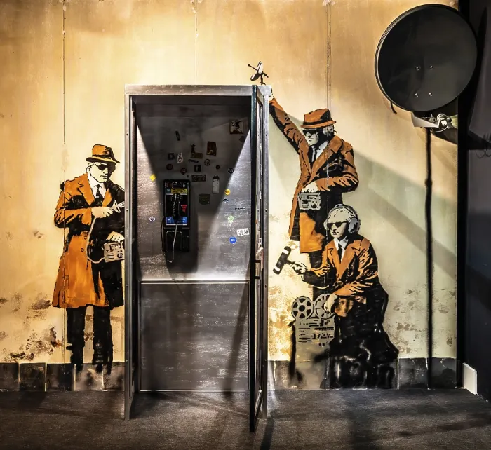 Framed Print : Banksy - Spy Booth, reference to state surveillance
