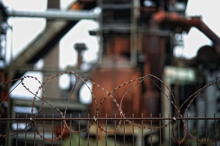 Framed Print : Barbed wire fence, former Phoenix West steelworks