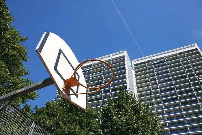 Framed Print : Basketball court at a residential complex in the city