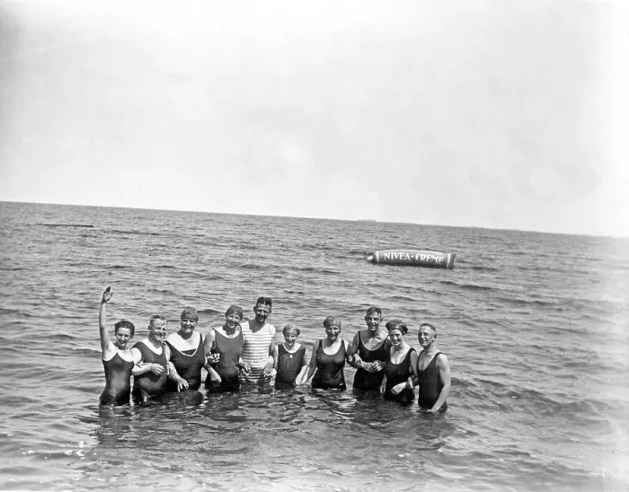 Framed Print : Bathing group on the beach, funny