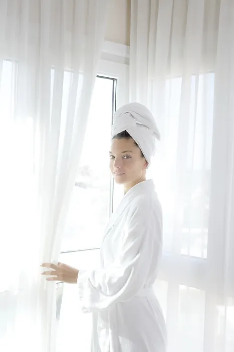 Framed Print : Bathrobe happy woman sunny hotel window white curtains Framed Print : Bathrobe happy woman sunny hotel window white curtains