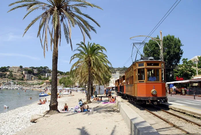 Framed Print : Bay with beach and palm trees, tram in Puerto Soller Framed Print : Bay with beach and palm trees, tram in Puerto Soller