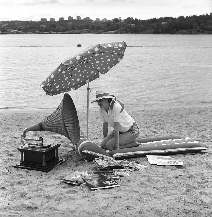 Framed Print : On the beach 1960. A young woman on a beach Framed Print : On the beach 1960. A young woman on a beach