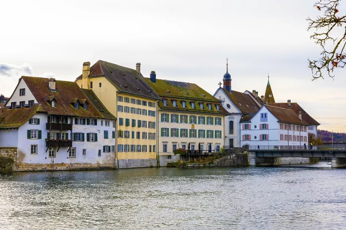 Framed Print : The Beautiful Baroque Old Town with House and River Aare with Sunlight in a Sunny Autumn Day in Solothurn Framed Print : The Beautiful Baroque Old Town with House and River Aare with Sunlight in a Sunny Autumn Day in Solothurn