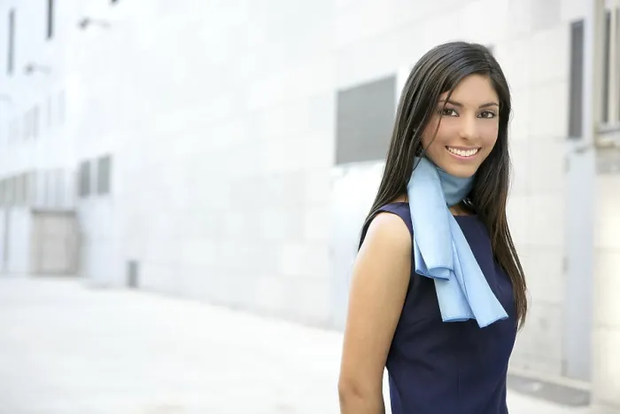 Framed Print : Beautiful blue dress stewardess walking to convention center