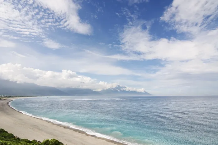 Framed Print : Beautiful seascape with shoreline and mountain in the distance