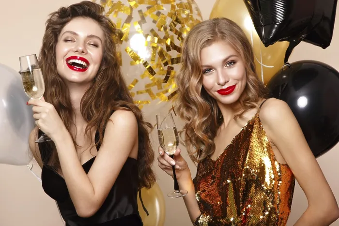 Framed Print : Beautiful young women in elegant evening dresses with festive balloons