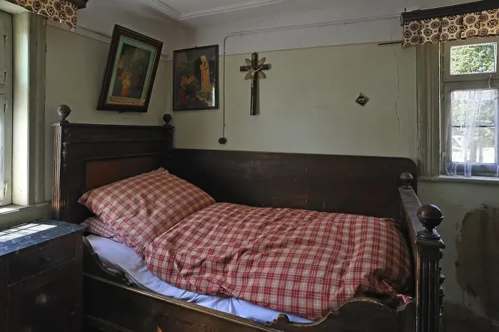 Framed Print : Bed in the lower bedroom at the time around 1920