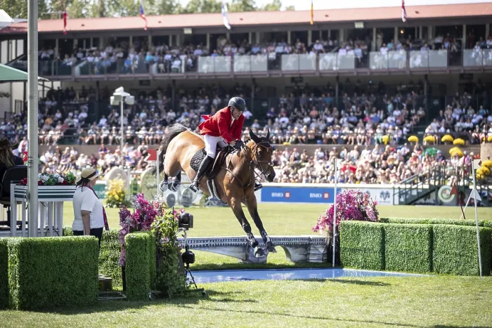 Framed Print : Ben Asselin of Canada and riding Luikan Q compete in the first round of the 1
