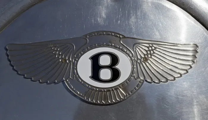 Framed Print : Bentley emblem on an aluminum bodied Bentley 4
