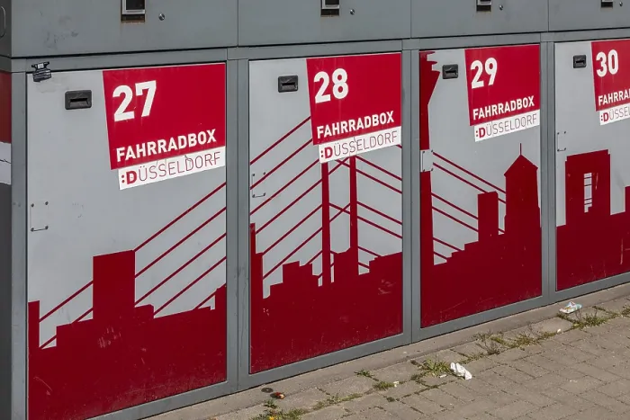 Framed Print : Bicycle boxes at Dusseldorf Airport railway station