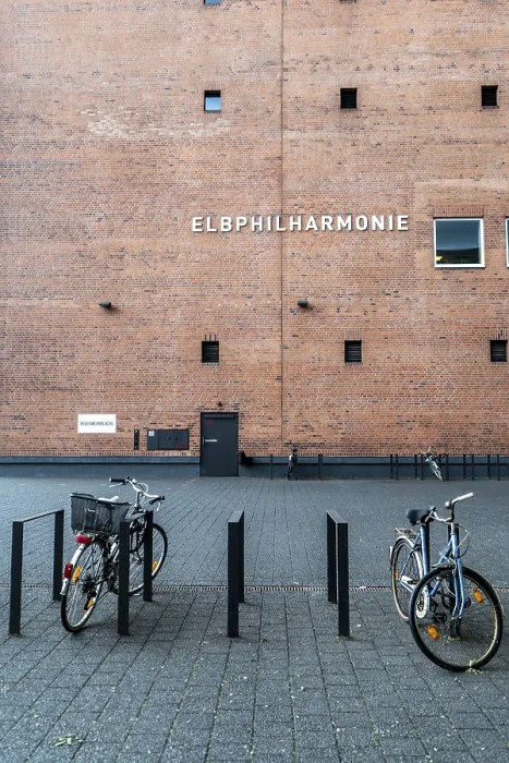 Framed Print : Bicycles parked in front of the brick facade of the Elbphilharmonie in Hamburg Framed Print : Bicycles parked in front of the brick facade of the Elbphilharmonie in Hamburg
