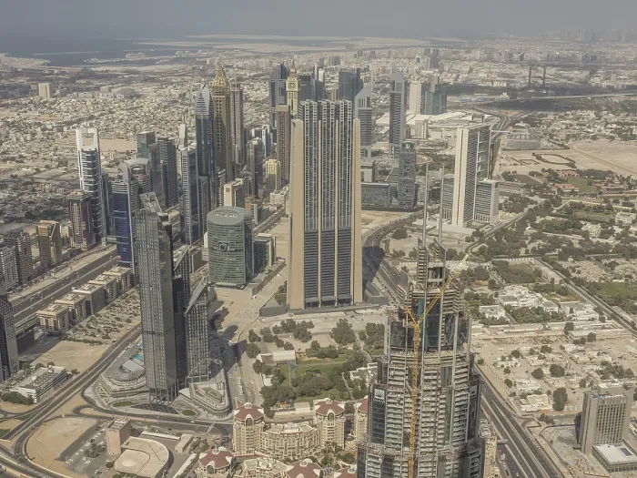 Framed Print : Bird's eye view of urban skyline with futuristic skyscrapers under clear sky
