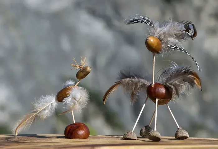 Framed Print : Two birds, funny animal figures made of chestnuts and acorns