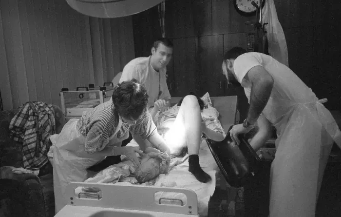 Framed Print : Birth in hospital, doctor and midwife