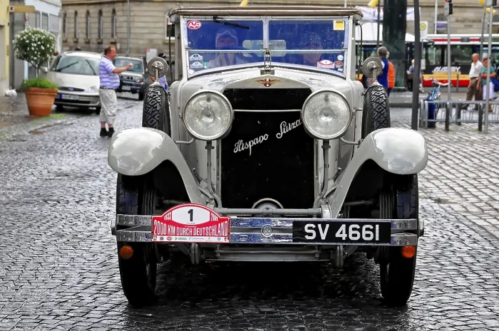 Framed Print : A black Alvis vintage car on a cobblestone road during a rally Framed Print : A black Alvis vintage car on a cobblestone road during a rally