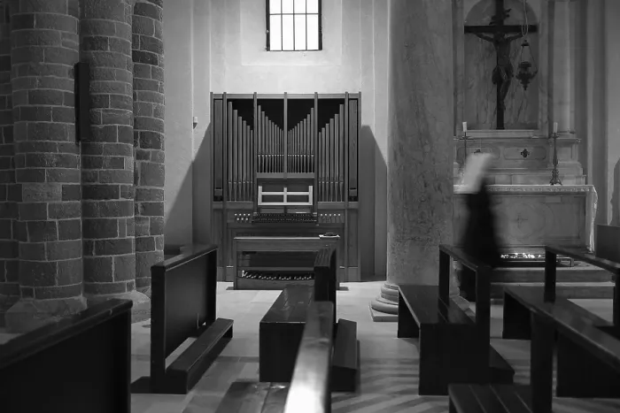 Framed Print : A black and white photo of a church interior with an organ
