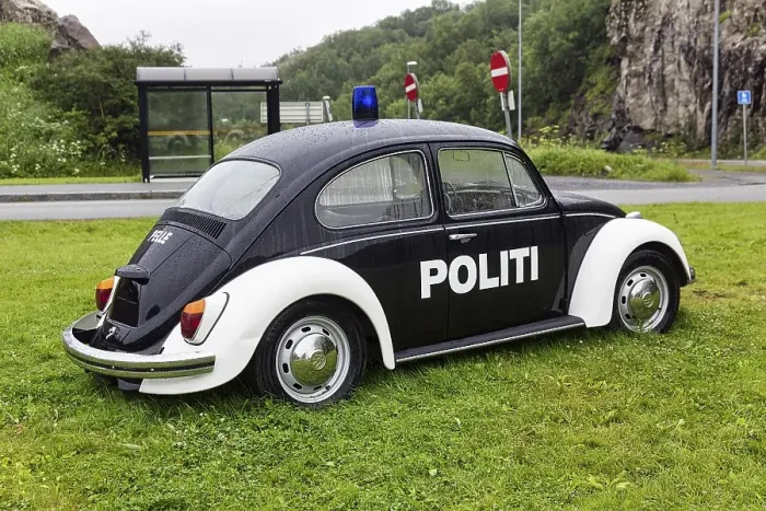 Framed Print : Black and white police patrol car with lettering Politi