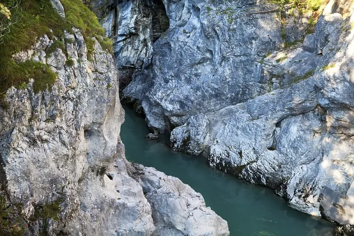 Framed Print : Blue alpine river between two cliffs