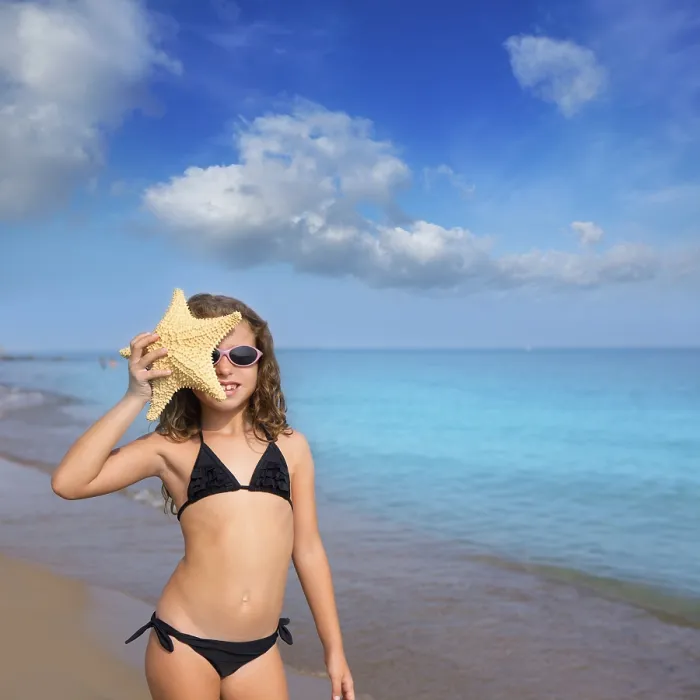 Framed Print : Blue beach kid girl with bikini starfish and sunglasses at summer vacations