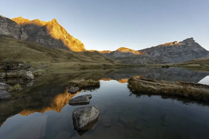 Framed Print : The Blue Lake at sunrise near Melchsee-Frutt on the Aa Alp in the Melch Valley